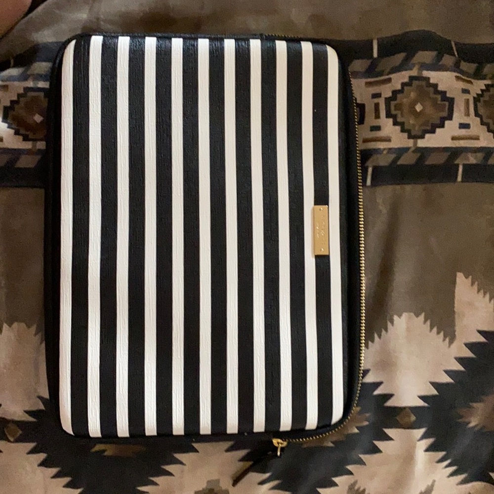 A Kate Spade laptop sleeve